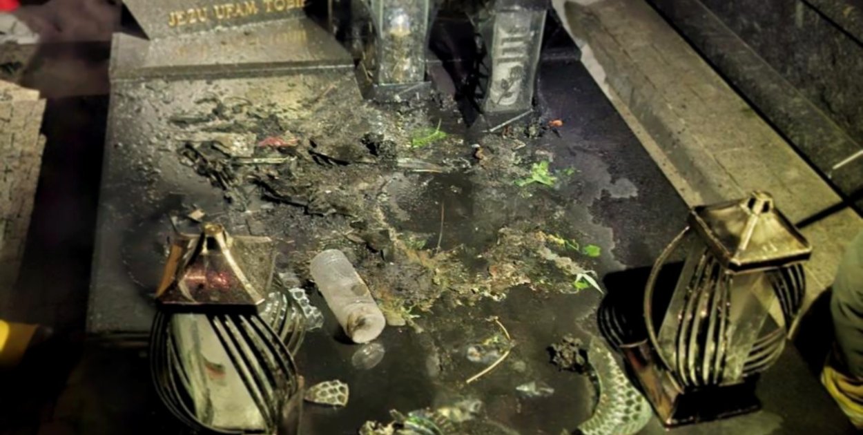 Strażacy gasili pożar... zniczy na grobowcu